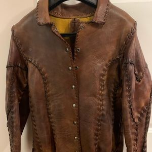 Leather jacket. It’s handmade . Never worn. To big for me.